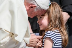 Pope Francis greets Lizzy Myers