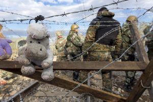 Macedonia's army finishes the building of a razor-wired fence at the border with Greece